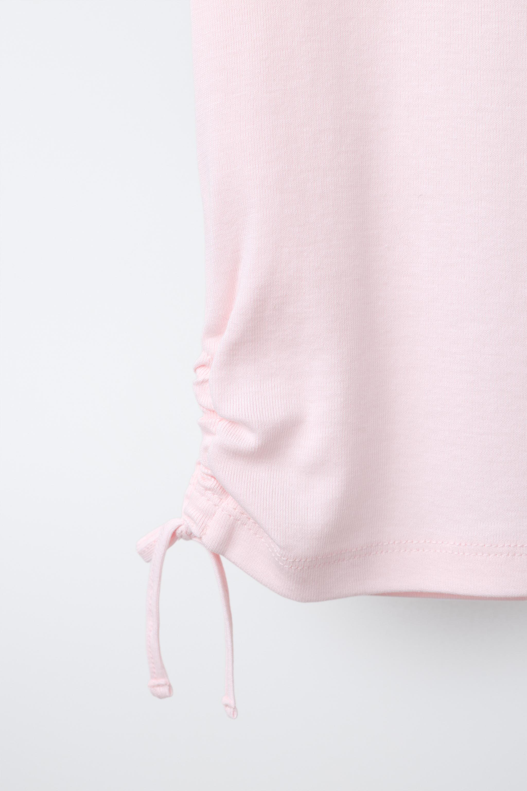 MODAL T-SHIRT WITH CUT OUTS AND BOWS